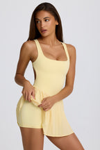 [LIMITLESS_COLOR:LEMON] BO+TEE Soft Active Open-Back Pleated Tennis Dress — LEMON — Vista oficial 3