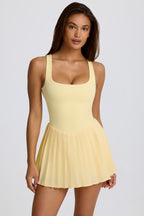 [LIMITLESS_COLOR:LEMON] BO+TEE Soft Active Open-Back Pleated Tennis Dress — LEMON — Vista oficial 1