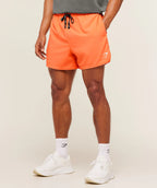 [LIMITLESS_COLOR:DAYGLOW PEACH] GYMSHARK Train 5" Shorts — DAYGLOW PEACH — vista 1