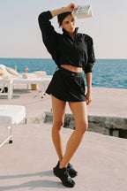 [LIMITLESS_COLOR:BLACK] ALO YOGA Match Point Tennis Skirt — BLACK — Vista oficial 1