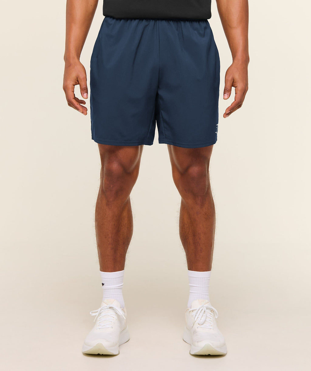 [LIMITLESS_COLOR:NAVY] GYMSHARK Arrival 7" Shorts — NAVY — Vista oficial 1