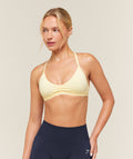 [LIMITLESS_COLOR:BUTTER YELLOW] GYMSHARK Minimal Sports Bra 2.0 — BUTTER YELLOW — Vista oficial 1