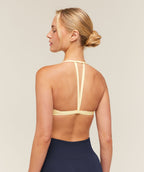 [LIMITLESS_COLOR:BUTTER YELLOW] GYMSHARK Minimal Sports Bra 2.0 — BUTTER YELLOW — Vista oficial 2