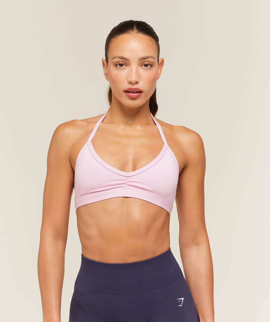 [LIMITLESS_COLOR:HAZE PINK] GYMSHARK Light Support Minimal Halterneck Bra — HAZE PINK — vista oficial 1