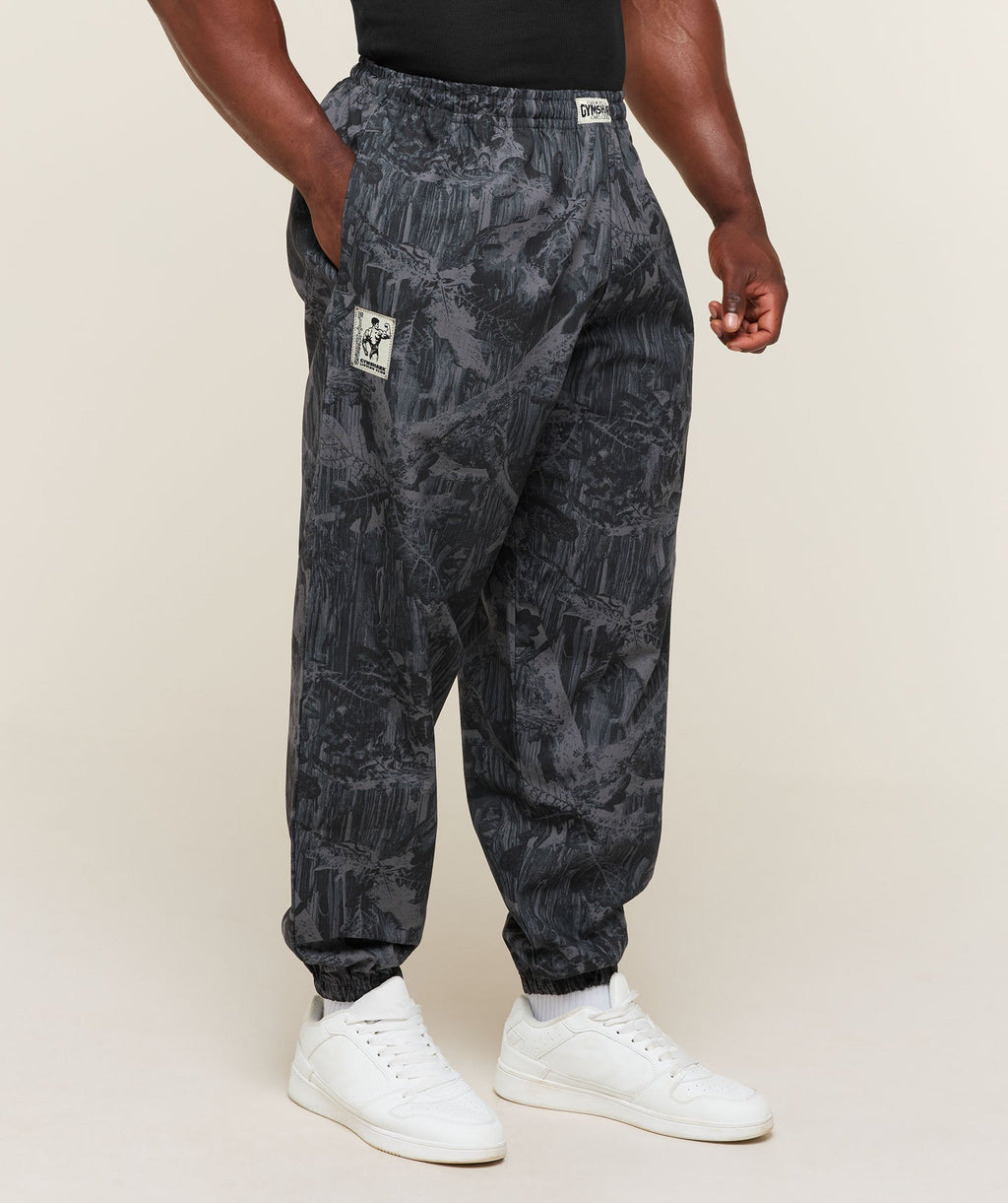 [LIMITLESS_COLOR:ONYX GREY] GYMSHARK Pumper Pants — ONYX GREY — vista oficial 1
