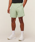 [LIMITLESS_COLOR:HAZE GREEN] GYMSHARK Arrival 7" Shorts — HAZE GREEN — vista oficial 1
