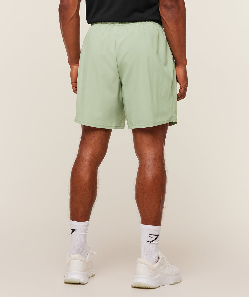 [LIMITLESS_COLOR:HAZE GREEN] GYMSHARK Arrival 7" Shorts — HAZE GREEN — vista oficial 2