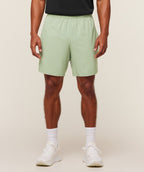 [LIMITLESS_COLOR:HAZE GREEN] GYMSHARK Arrival 7" Shorts — HAZE GREEN — vista oficial 3
