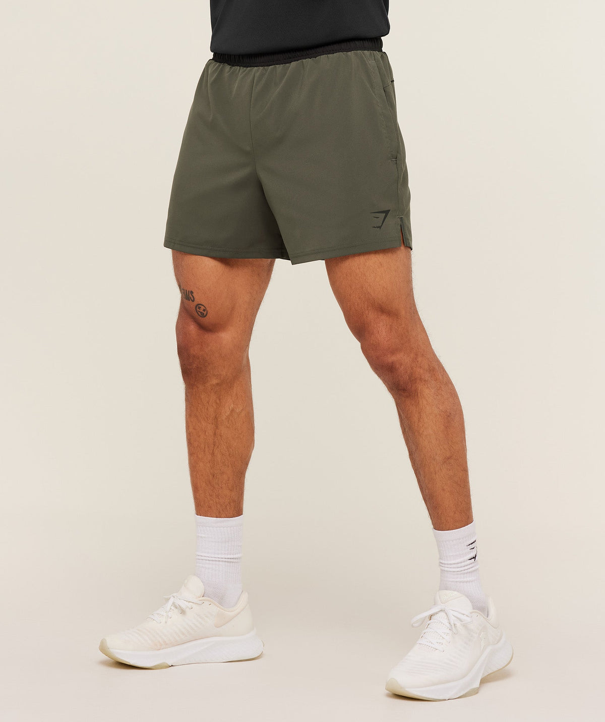 [LIMITLESS_COLOR:STRENGTH GREEN/BLACK] GYMSHARK Arrival Contrast Shorts — STRENGTH GREEN/BLACK — vista 1